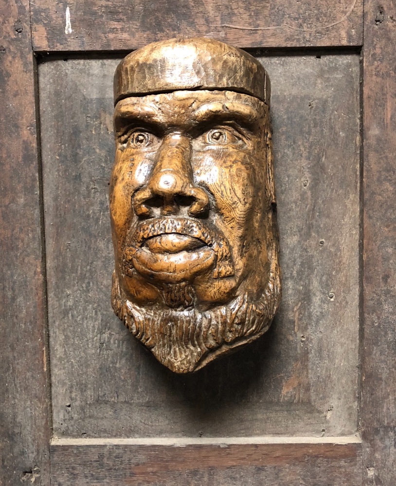 An 18th Century Carved Salt Cellar In The Form Of A Bearded Male Face .