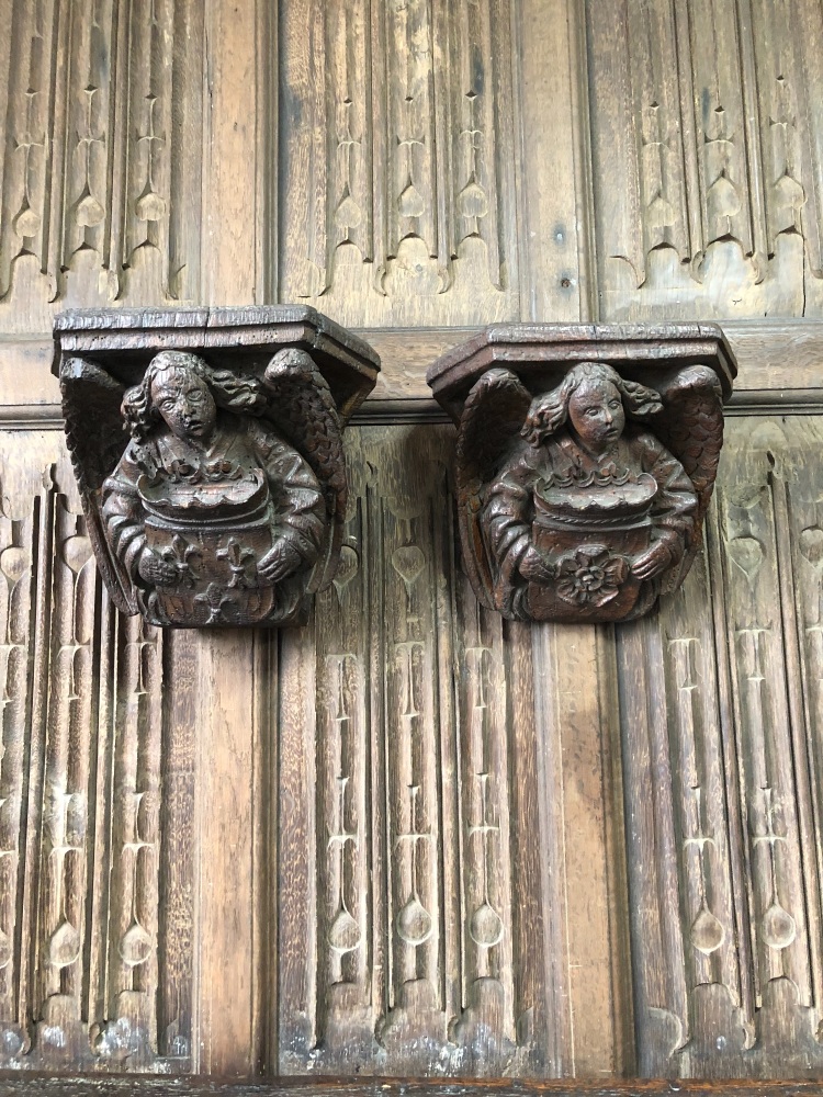 A Very Fine Pair Of Henry VII Carved Oak Angel Corbels Bearing The Coat Of 