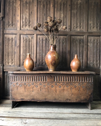A  17th Century Carved Oak Board Chest .