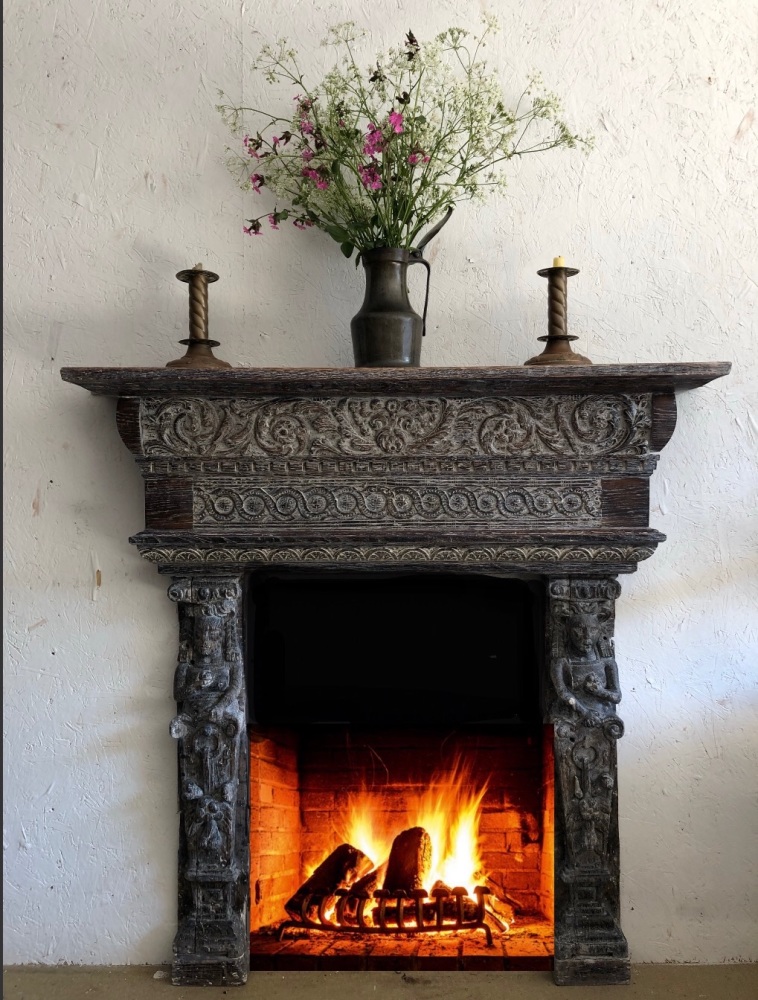 A Rare And Decorative Elizabethan Carved Oak Fire Surround SOLD