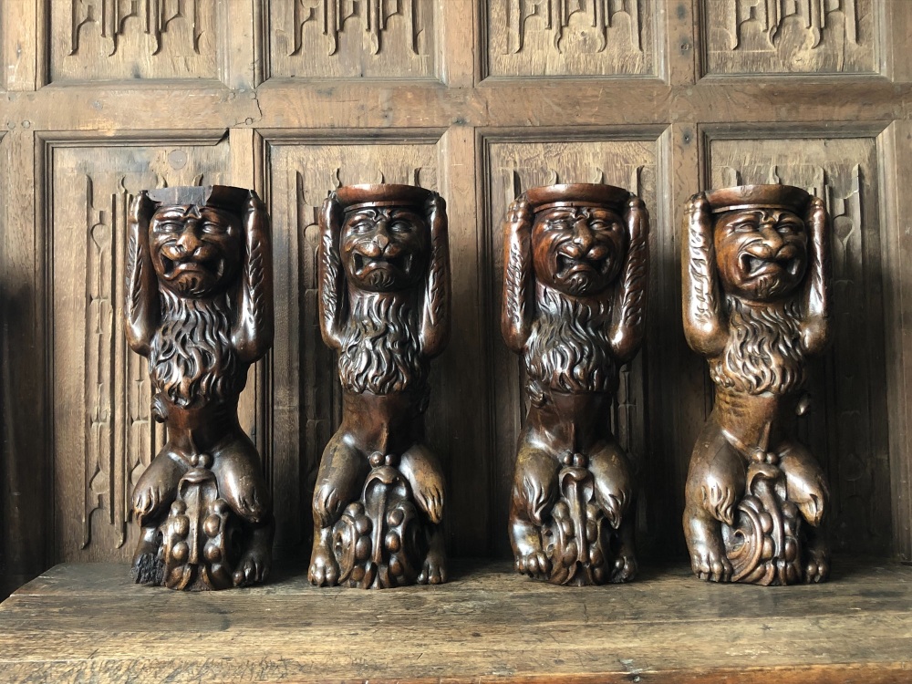 A Magnificent Set Of Four 16th century Carved Walnut Lions Seated On Grotesque Heads Originally Supports From A Buffet SOLD