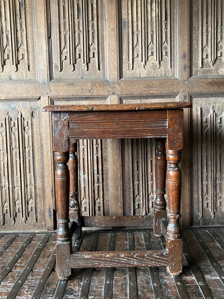 A Charles I Carved Oak Joined Stool.