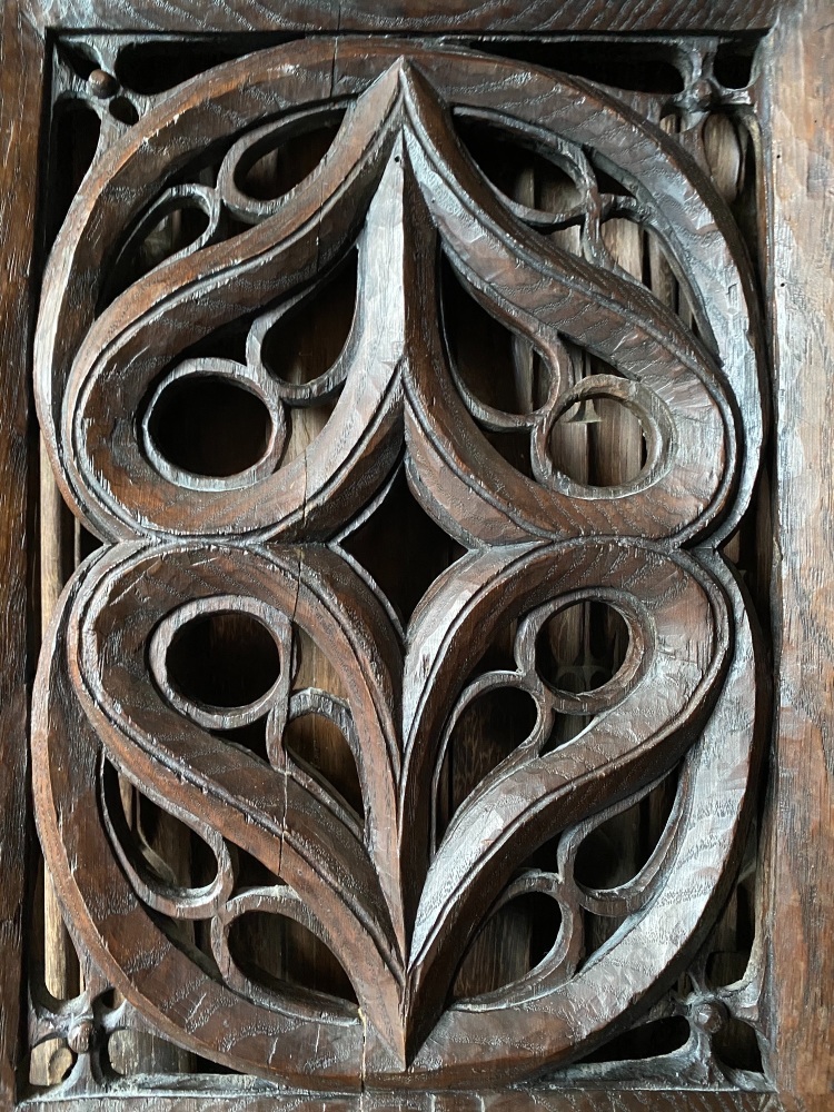 A Chunky 16th Century Chestnut Panel Carved With Pierced Tracery Design.SOLD