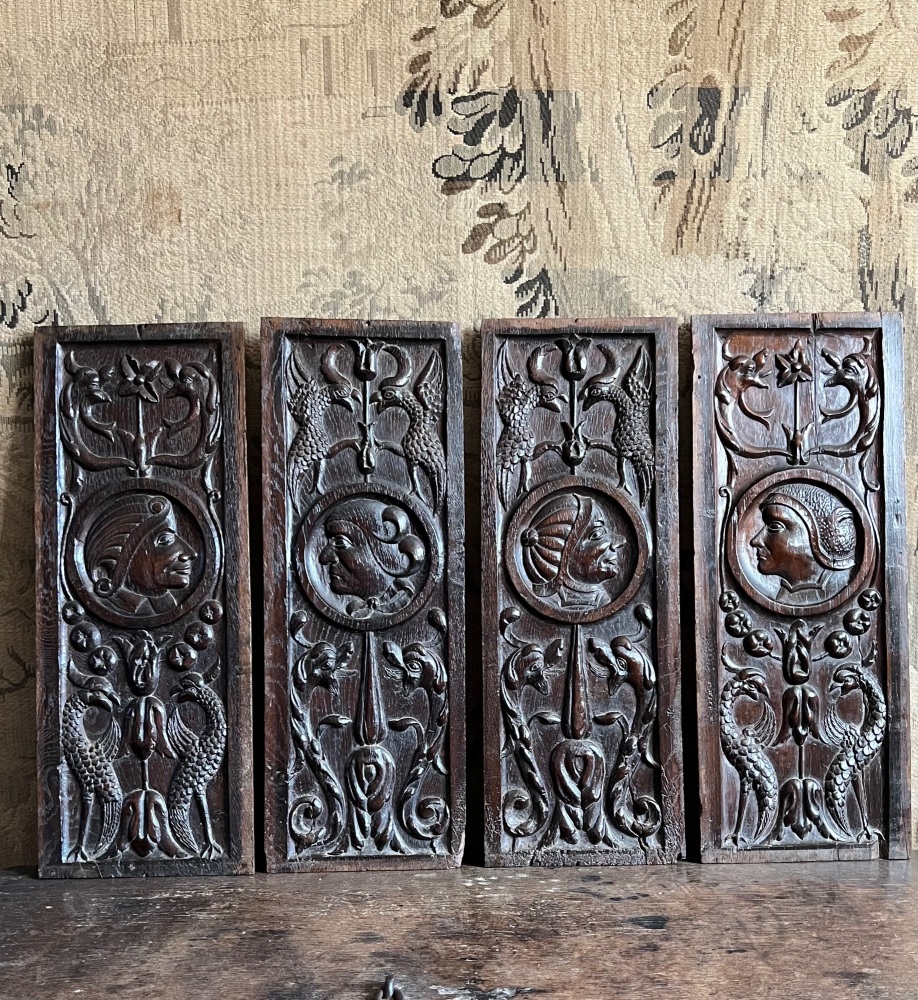 A Set Of Four 16th Century Carved Oak Romayne Panels 