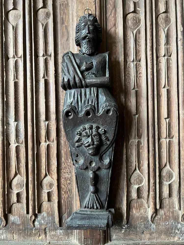An Elizabethan Carved Oak Caryatid Of A Bearded Male