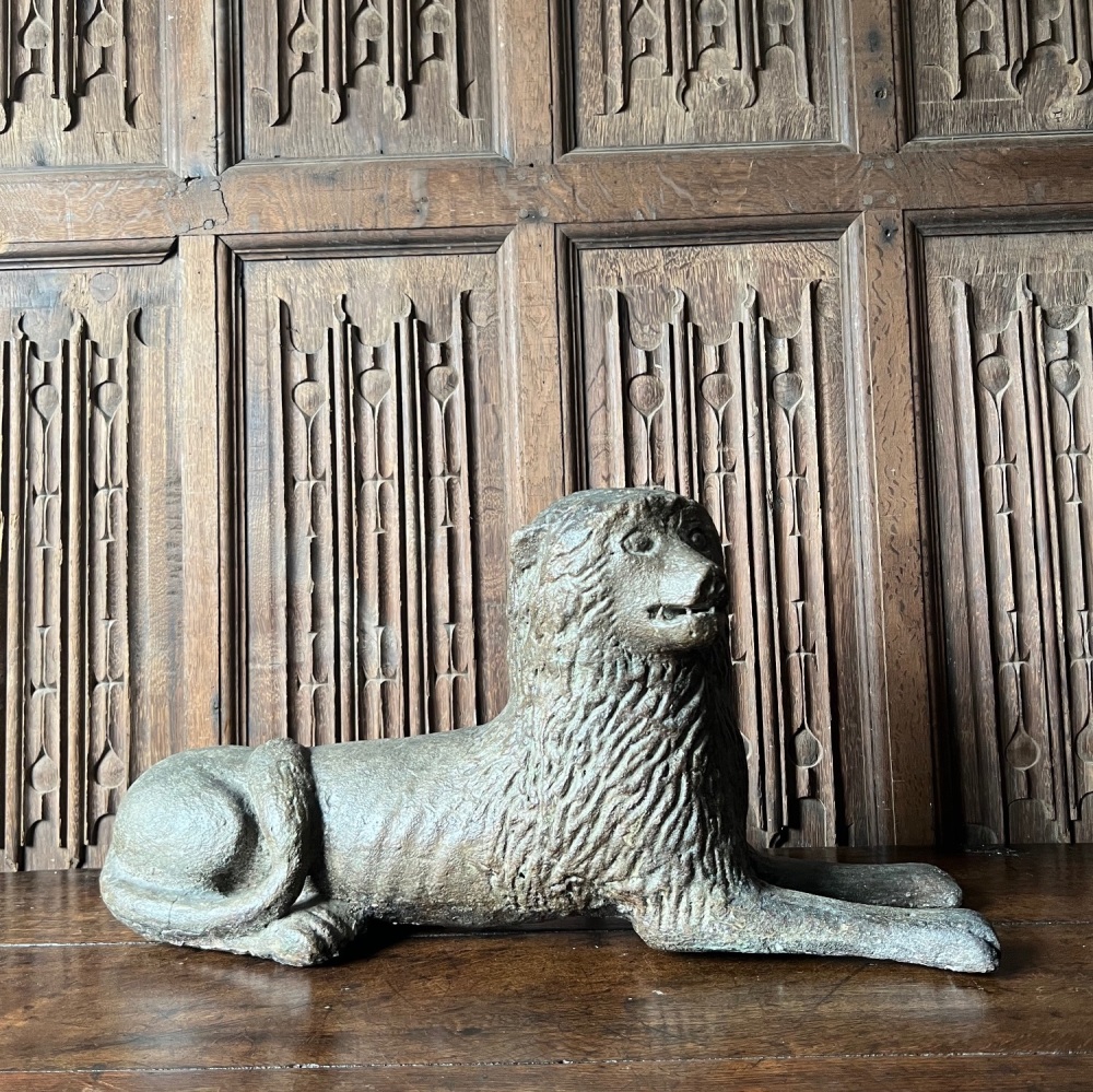 17th Century Carved Stone Lion In A Lying  Position With Traces Of Original Polychrome .