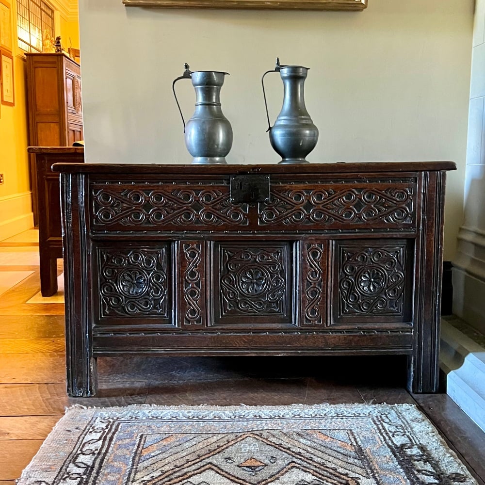 A 17th Century Westmoreland Oak Coffer Carved With S-scrolls to The Front With a Subtle Hidden Message.