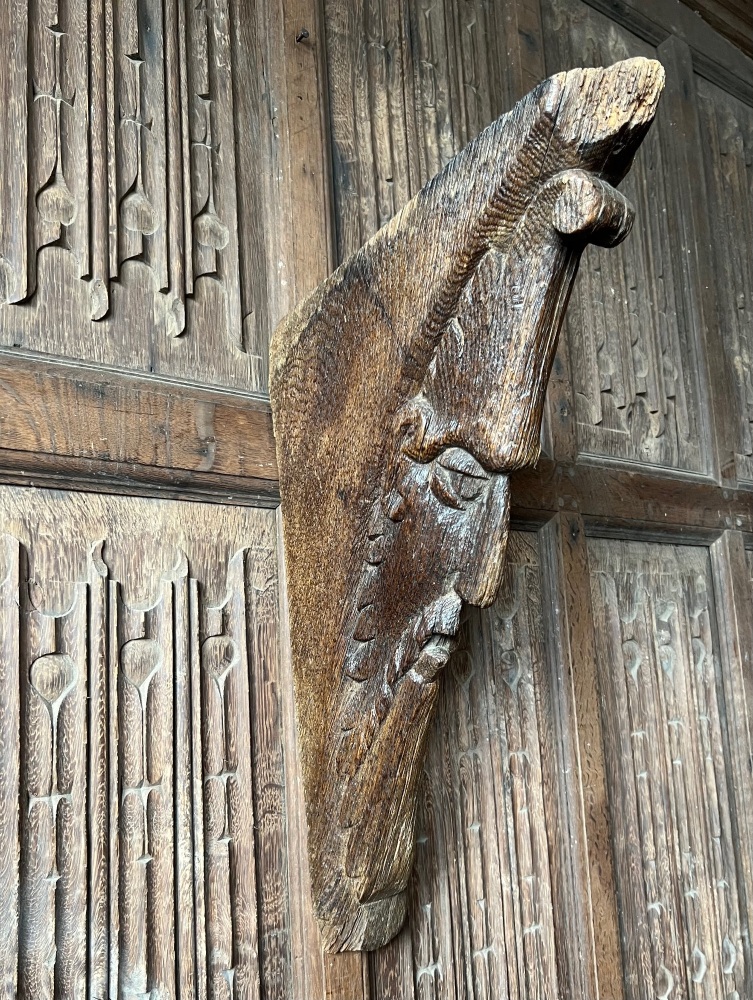 A Rare Medieval Carved Oak Brace Beam Depicting A Foliate Face .