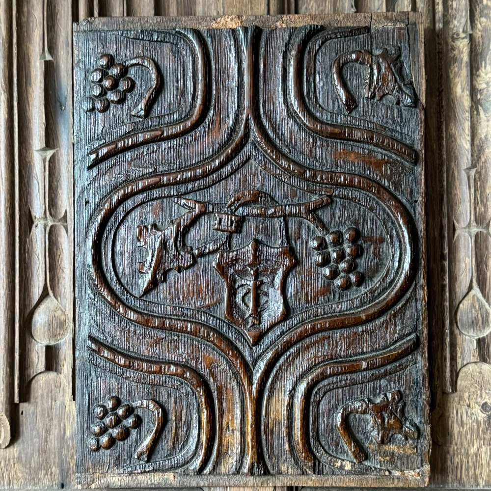 A wonderful Henry VIII Period Carved Oak Parchemin Panel With Central Padlock and Merchants Mark.
