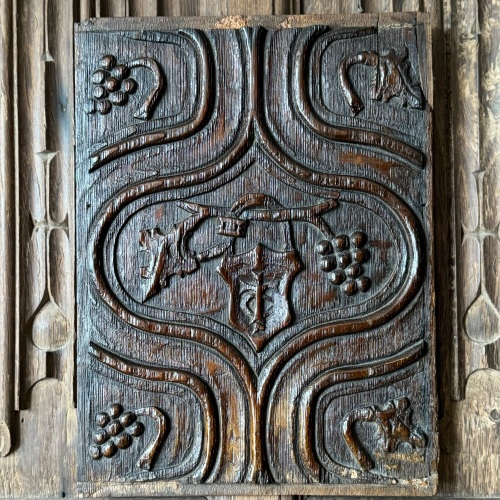 16th century carved oak parchemin panel with merchants mark.