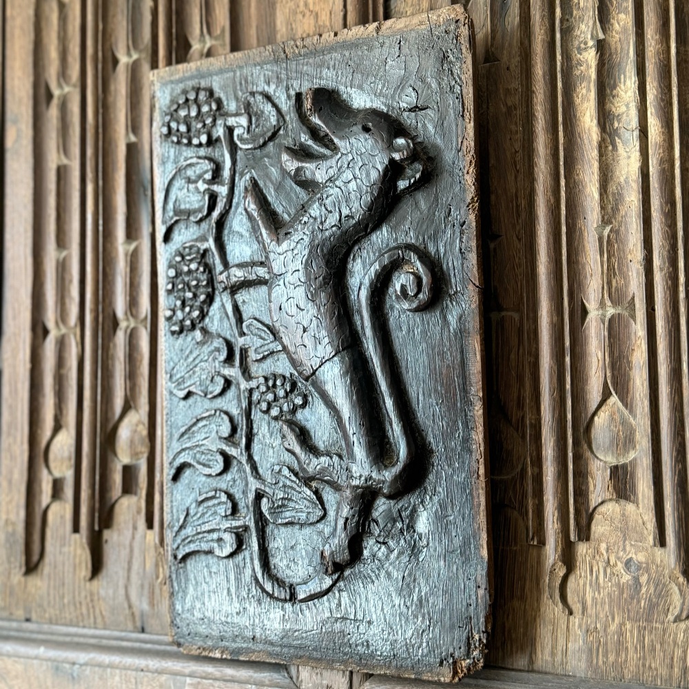 A 16th Century Carved Oak Panel Depicting A Lion Rampant With A Gothic Vine Trailing From His Back Leg.SOLDðŸ”´