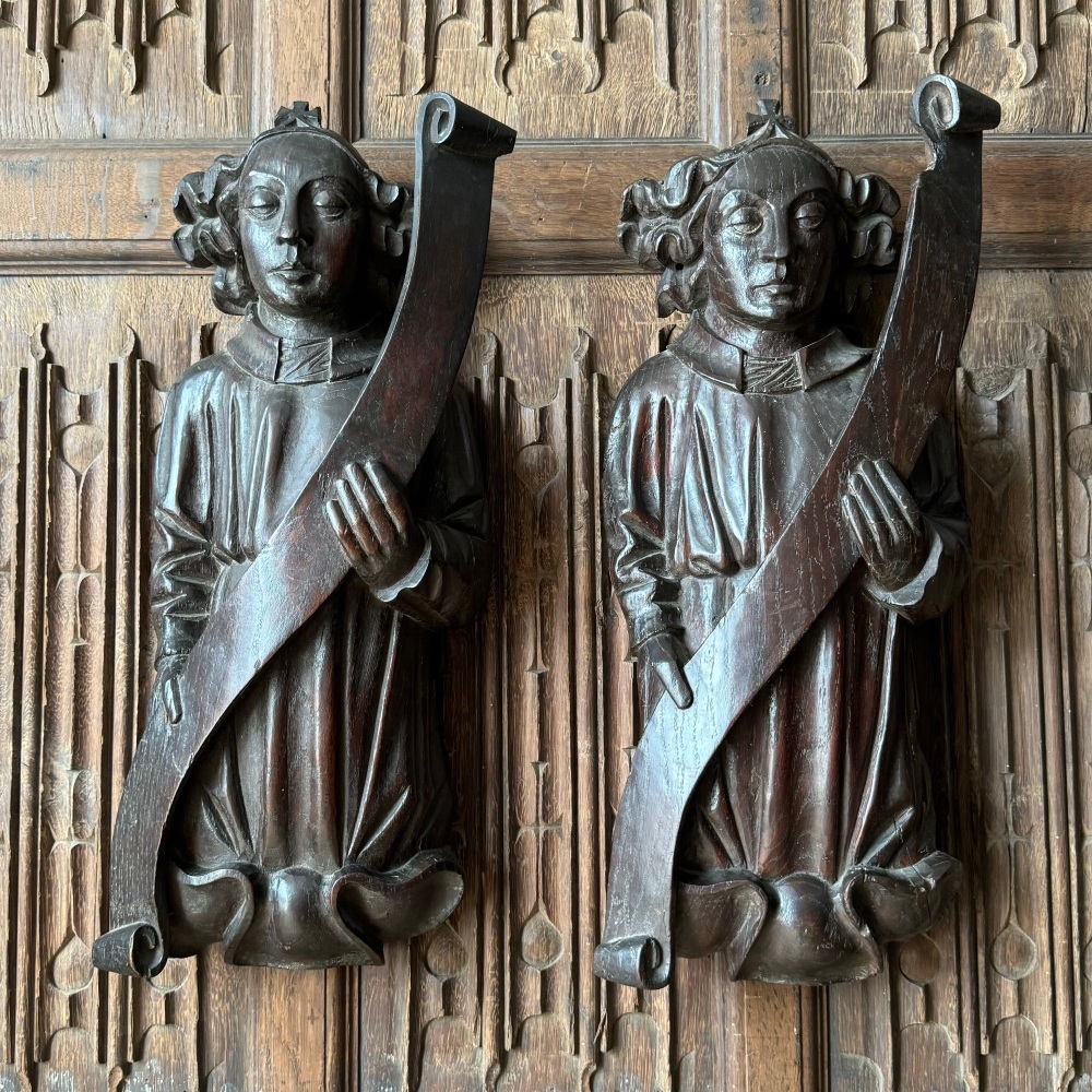 A Rare Pair Of English Late 16th Century Carved Oak  Angels.