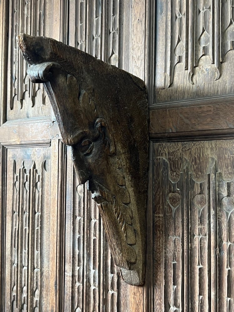 A Rare Medieval Carved Oak Brace Beam Depicting  A Foliate Face .