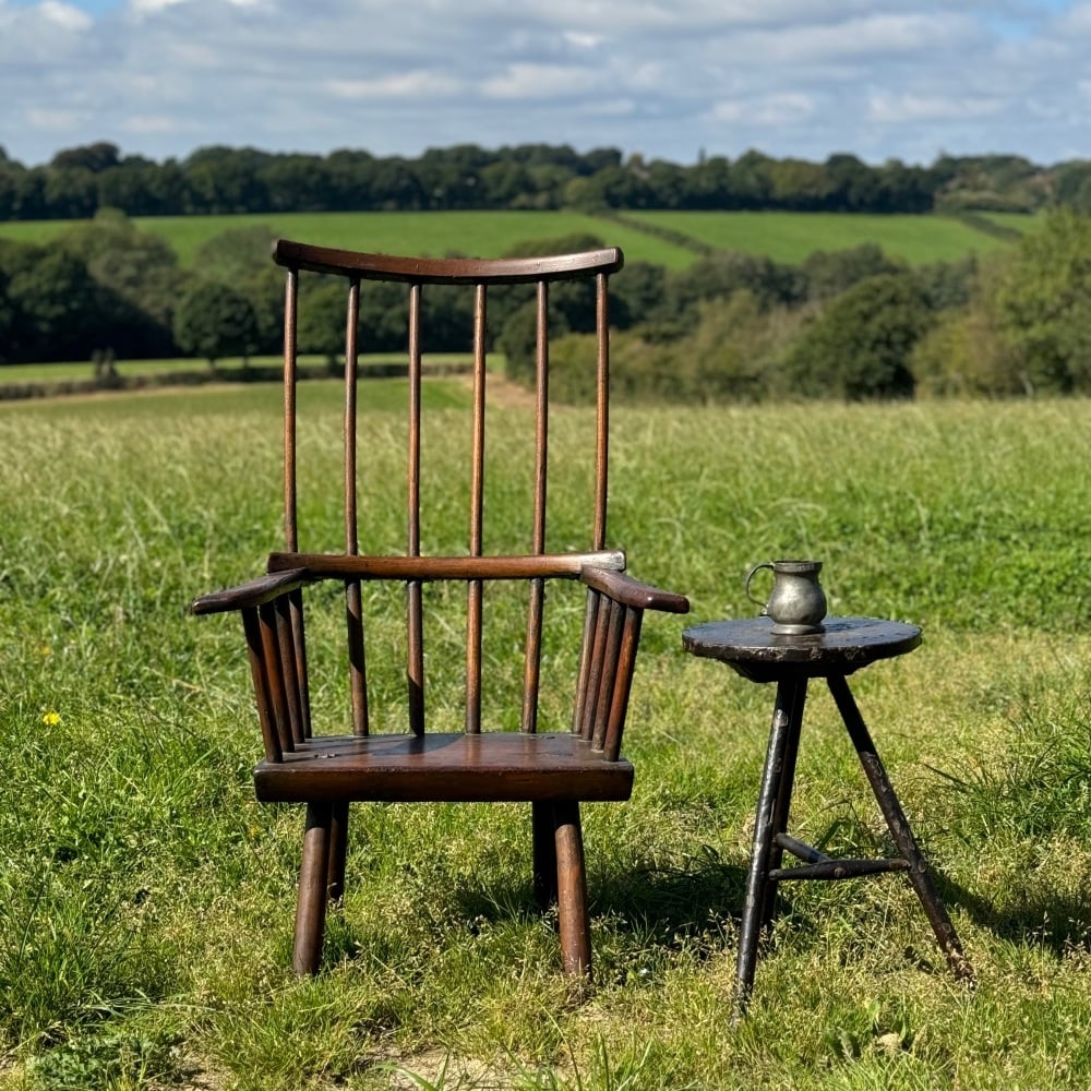 An 18th Century Ash and Elm Primitive Stick Back Chair.