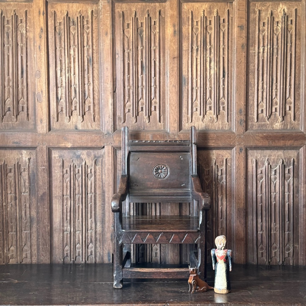 A Rare 17th Century Carved Oak Childs Armchair.