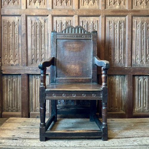 A 17th Century Welsh Oak Wainscot Chair With The Monmouth Bullseye Design.