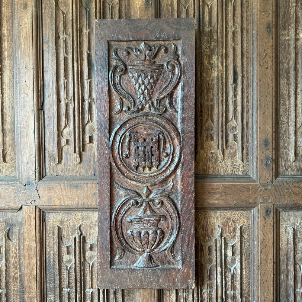 A 16th Century Carved Oak Panel Depicting The Arms Of Beaufort.