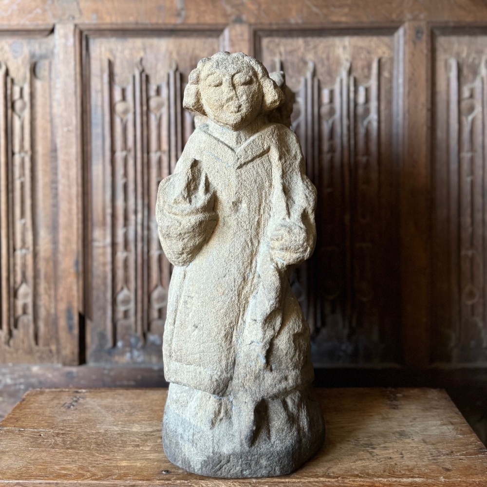 An Impressive 15th Century Carved Stone Figure Of An Angel.