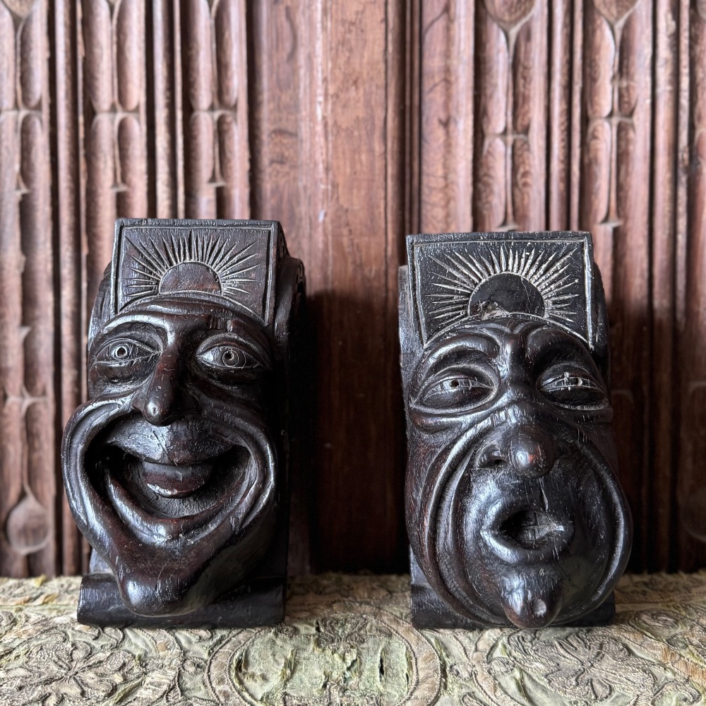 A Pair Of 18th Century Carved Oak Grotesque Faced Corbels.