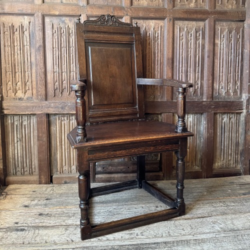A Charles I Joined Oak Caquetoire Salisbury Chair Circa 1625.