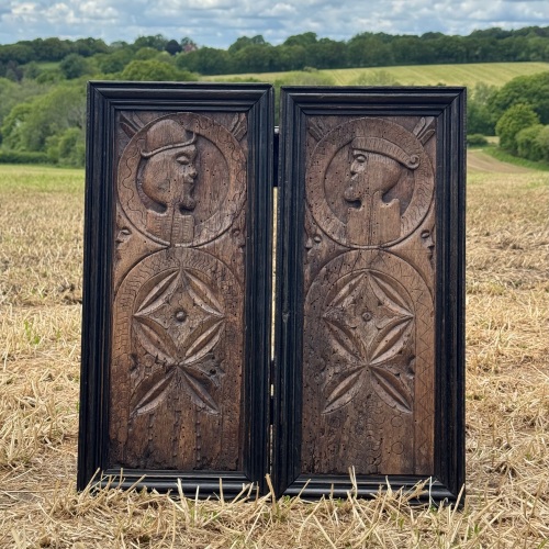 A Pair of Dry 16th Century Carved Walnut Profile Panels.