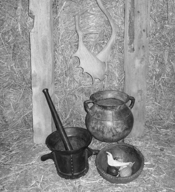 15th century cauldron and mortar