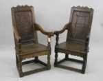 A pair of 17th century carved oak Wainscot chairs.