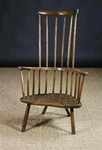 A spendid 18th Century Primitive Stick Back Chair with unusual high back
