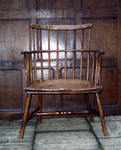An 18th Century ash and elm primitive country stick back chair