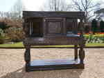 A fantastic jacobean carved oak and inlaid court cupboard