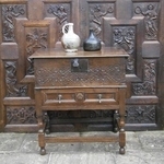 A Wonderful 17th century carved oak bible box on original stand.