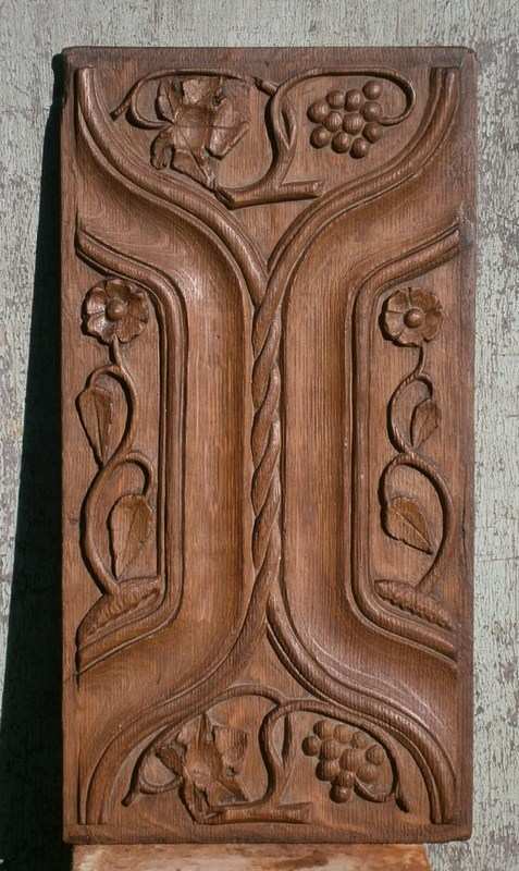 A 16th century English carved oak parchemin and linenfold panel