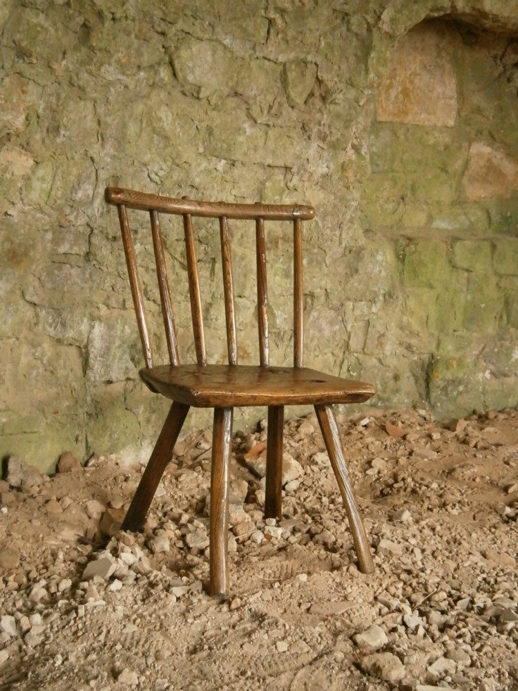 An Honest 18th Century Ash Hearth Chair Of Primitive Construction