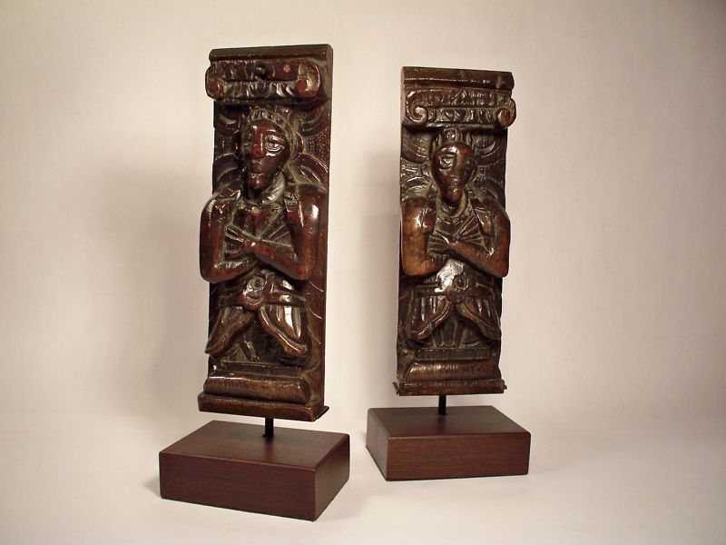 A pair of elizabethan carved oak caryatid figures
