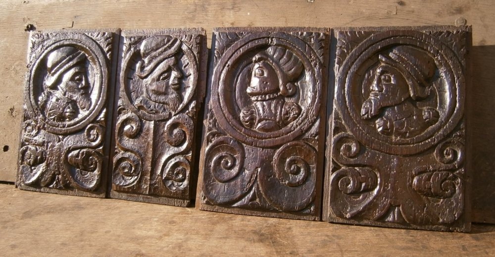 A Set Of Four 16th Century Carved Oak Romayne Profile Panels 