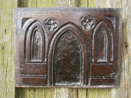 A 16th Century Gothic Oak Panel Depicting A Primitive Church Front