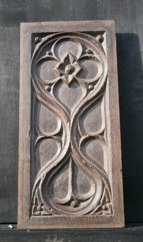 A 16th Century Gothic  Carved Oak Panel Depicting Tracery.