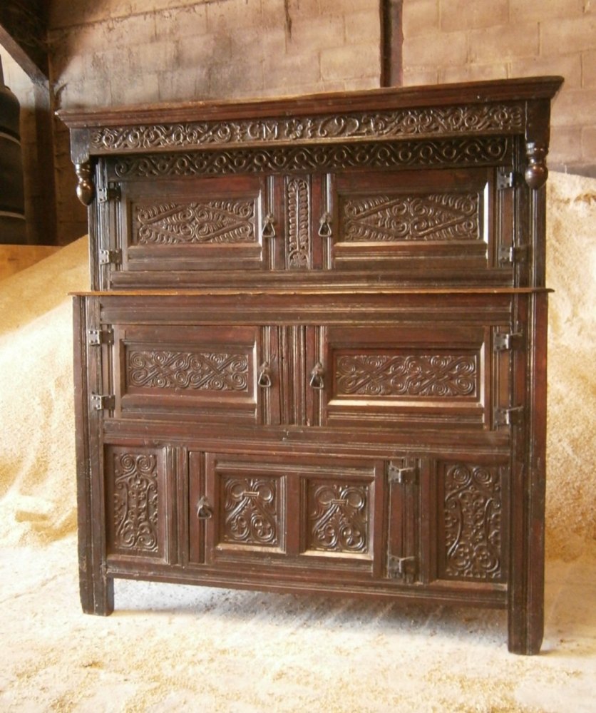 A 17th Century Westmorland Carved Oak Court Cupboard dated 1692