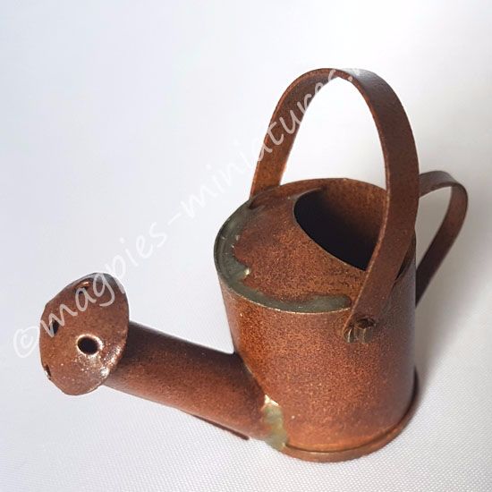 Rusty watering can
