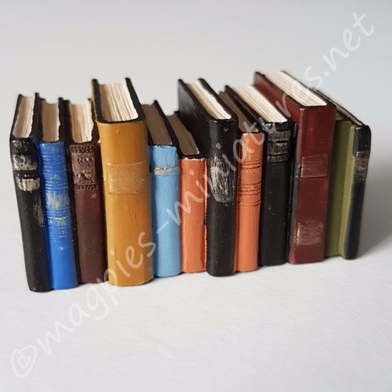 Row of worn books, (long)
