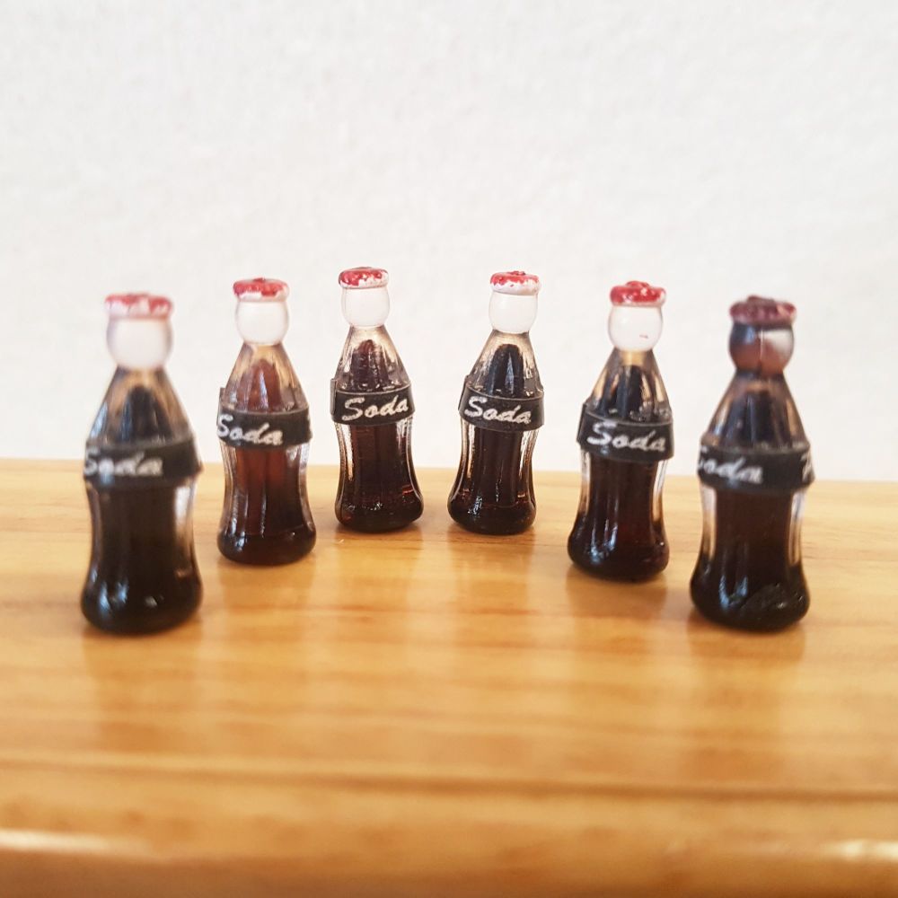 6 Cola Bottles