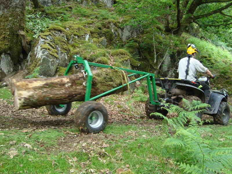 Fron Goch extracting timber from off the beaten track using Quad and Loggin
