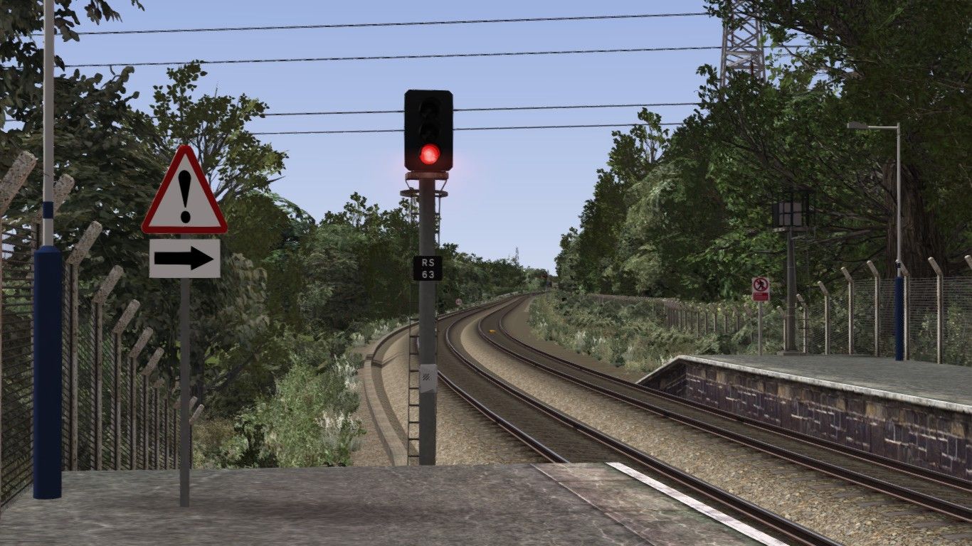 Image depicting a signal reminder board along with accompanying direction arrow.
