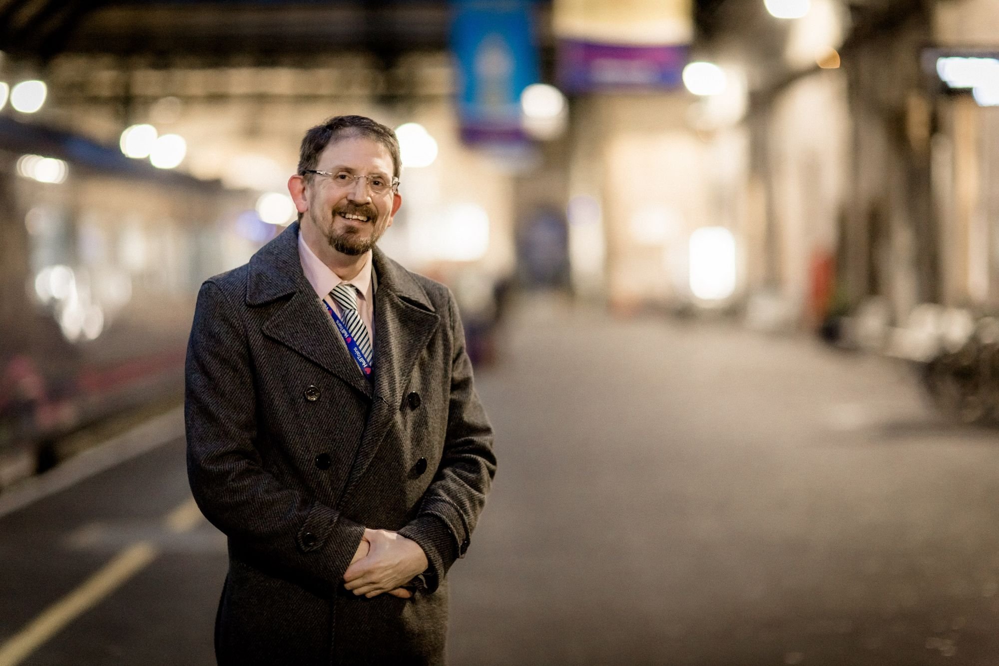 New Hull Trains appointment Mark Shepherd stands at a station