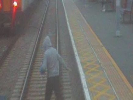 Image showing a trespasser on the railway line