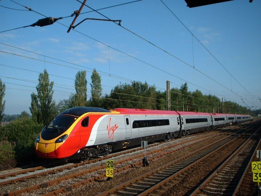 Image showing set 390002 waiting on the Slow road south of Preston in connection with its naming ceremony on 4th August 2002