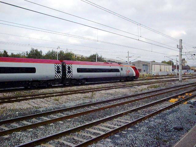 Image showing an unidentified set leaving Carnforth on a driver training run to Carlisle on 10th October 2002