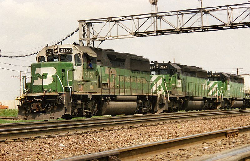Image showing  BN 3157, an EMD GP50, leads a westbound train through Eola (just east of Aurora, Illinois)