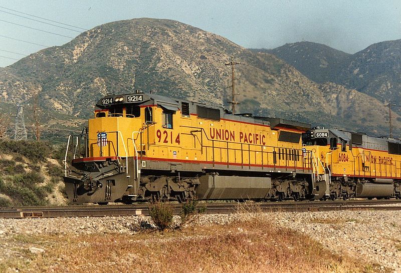 Image showing Union Pacific Railroad 9214, a GE Dash 8-40C, leading an eastbound train up California's Cajon Pass on May 10, 1991