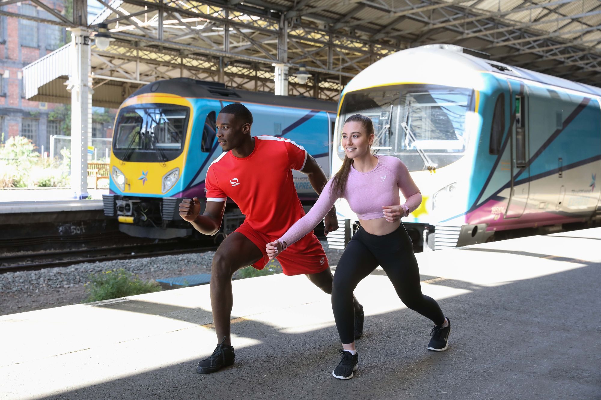 Image showing athletes in front of TransPennine Express trains